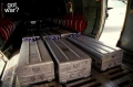 120_got_war_05_three_metal_coffins_in_plane.jpg