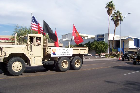 veterans_day_march_phx-anti_war_marchers_11-12-07_army_trucks_1.jpg 