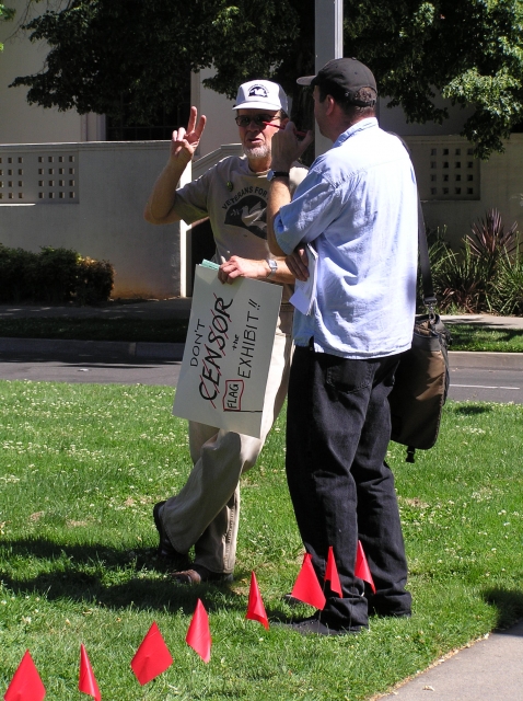640_john_w_reporter_and_flags.jpg original image ( 1712x2288)