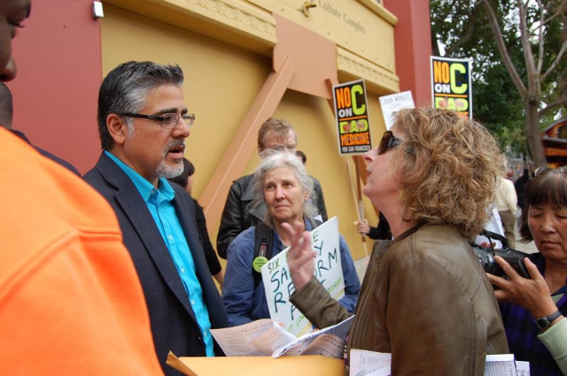 640_avalos_explains_why_he_is_inside_to_retirees_picketing.jpg