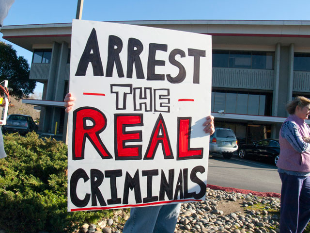 arrest-the-real-criminals_2-15-12.jpg 