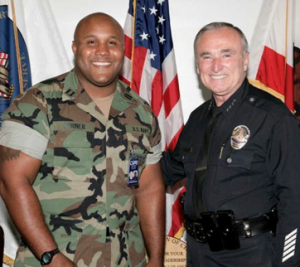 christopher_dorner_w_chief_william_bratton.png 