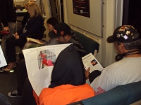 200_giants_fan_reading_leaflet.jpg original image ( 864x648)