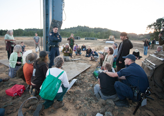 protesters_sit_at_worksite.jpg 