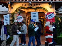 Labor Gives Management Bag of Coal at La Playa Carmel Holiday Workers Rally