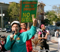 Protesters Say "No Sit and Lie Laws"