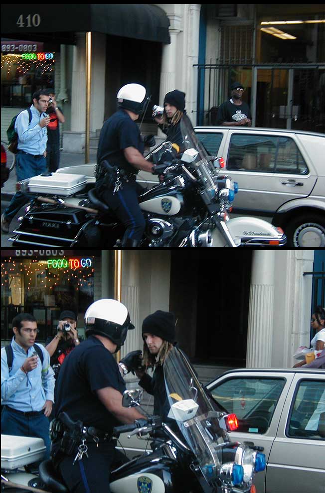 policegrabsvideographer.jpg 