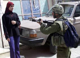 a__zionist_jew_aiming_at_an_innocent_palestinian__woman.jpg 