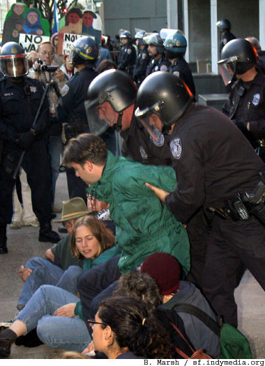 nowar_sf_fed_101102_arrest_green_jacket.jpg 