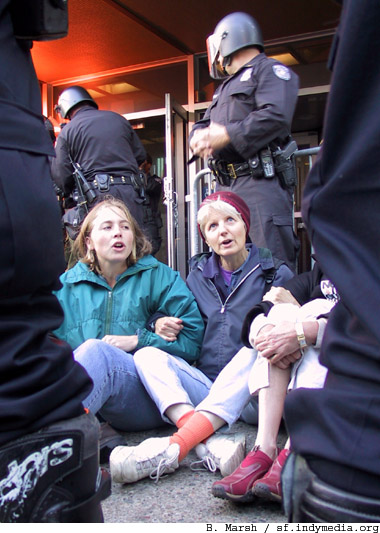 nowar_sf_fed_101102_sitdown_blockade_chanting.jpg 