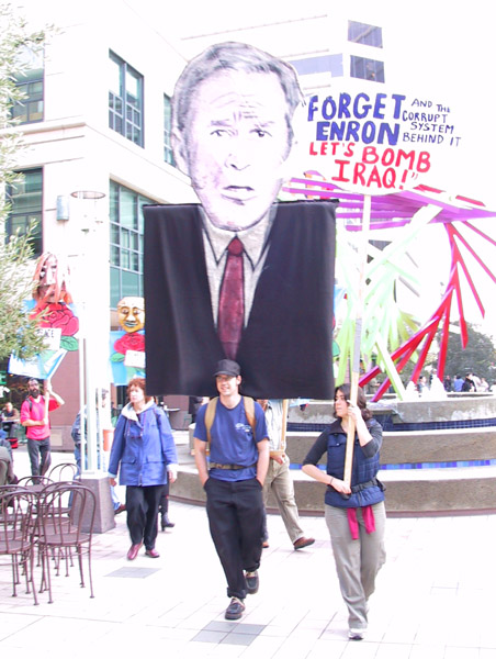 121002_oakfed_nowar_08_forget_enron_war_iraq_gwb_puppet.jpg 