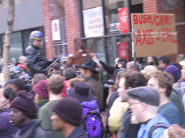 021603_sf_antiwar_horsecop_sidewalk_charge.jpg 