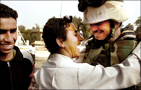 happy-iraqi-hugs-soldier.jpg 