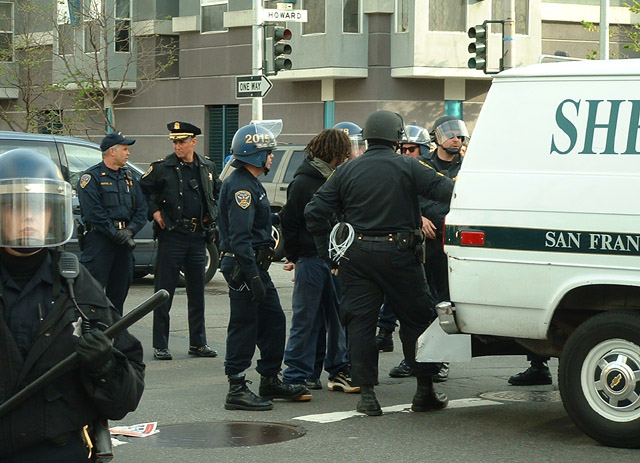032203_sfantiwar_7thhoward_falsearrest_redsquad.jpg 