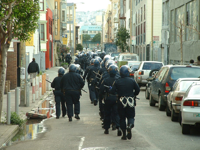 032203_sfantiwar_copsinthealley.jpg 