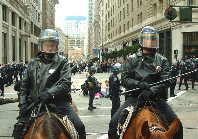 032003_09_sfantiwar_horsecopsarrests.jpg 
