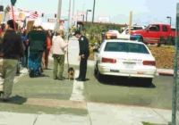 200_4-5-03__fbpd_talking_to_peace_activist___her_peace_dog_hwy_1.jpg