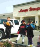 200_4-5-03_local_latino_children_watching_peace_march_fortbragg_ca.jpg