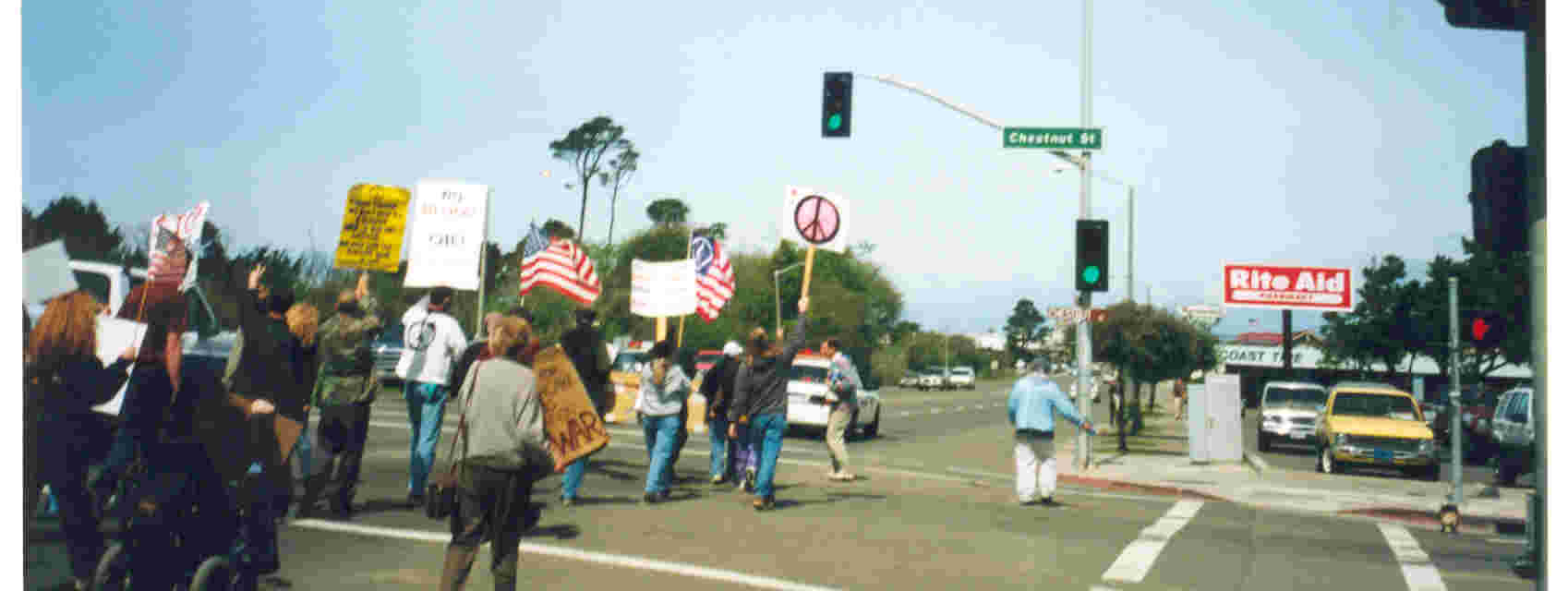 april_5_2003_peace_protestors_walking_towardsfortbragg_town_hall_001.jpg 