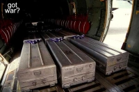 200_got_war_05_three_metal_coffins_in_plane.jpg