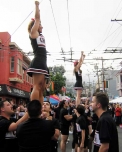 200_cheerleadersreaching.jpg