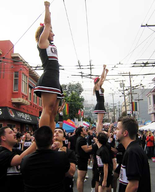 cheerleadersreaching.jpg 
