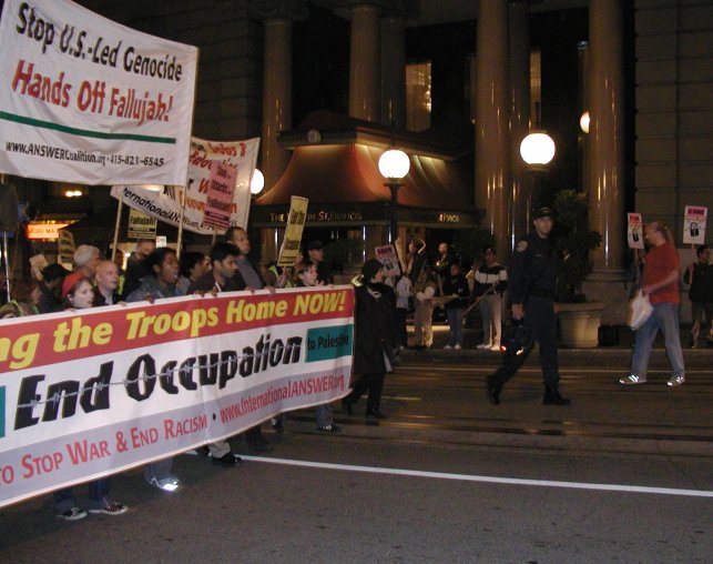 crowd_marches_past_st_francis.jpg 