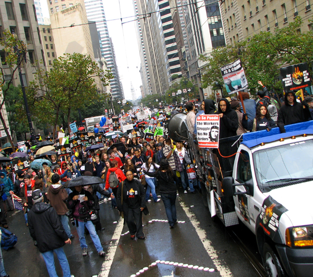 Thousands braved the cold rain in San Francisco today to say "Bush Step Down" and "Drive Out the Bush Regime".
As part of a "national day of mass resistance" San Francisco was one of of over 2