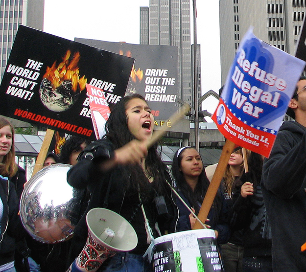 Thousands braved the cold rain in San Francisco today to say "Bush Step Down" and "Drive Out the Bush Regime".
As part of a "national day of mass resistance" San Francisco was one of of over 2