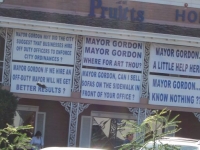 immigration_protest_at_pruitt__s_in_phx_az_11-10-07_bldg_signs.jpg