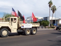 veterans_day_march_phx-anti_war_marchers_11-12-07_army_trucks_1.jpg