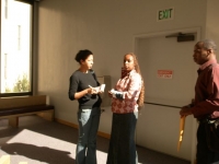 kpfa_staffer_nadra_haeidy_foster_with_sf_chronicle_reporter_outside_court8_25_2008.jpg