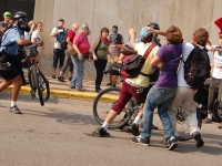 200_bike_cop_attacks_protester-ps.jpg