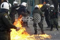 The riot police headquarters in Zografou, Athens were attacked earlier today, with one riot police van and a few cars burnt.nnIndymedia reports that the state-run TV station NET was occupied for a f