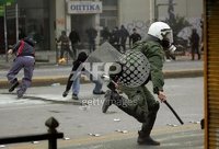 The riot police headquarters in Zografou, Athens were attacked earlier today, with one riot police van and a few cars burnt.nnIndymedia reports that the state-run TV station NET was occupied for a f