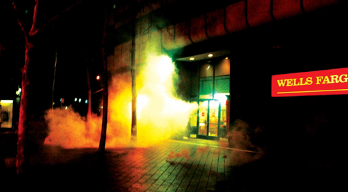 oakland-rebellion-wells-fargo-teargas-011409-by-josh-warren-white-web.jpg 