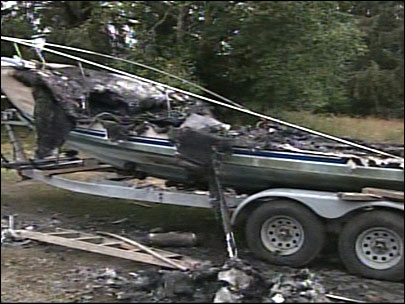 naalpr_burnedboat.jpg 
