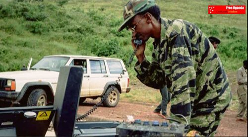 kagame_on_his_sat_phone.jpg 