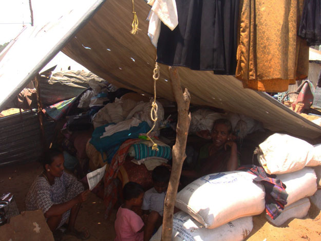 situation_report_9th_may_2009_settling_in_new_tent.jpg 