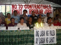 filipino-workers-press-talk.jpg