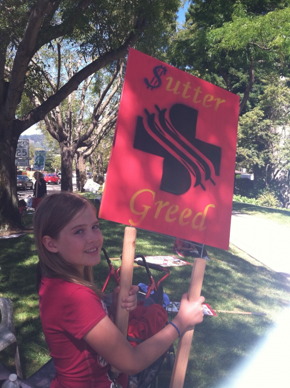 800_oakcnasuttergreedsign.jpg 