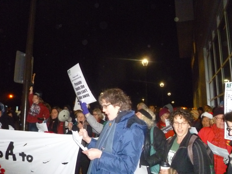 800_aft_2121_faculty_sing_outside_trustees_meeting.jpg 