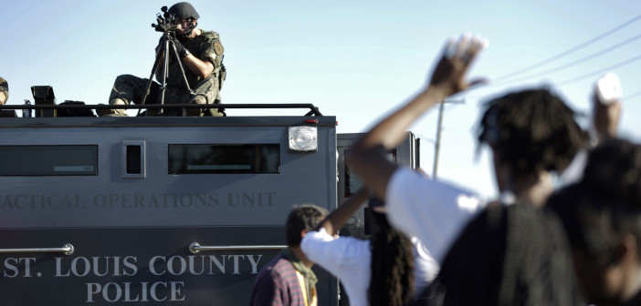 ferguson_weapons_standoff-702x336.jpg 