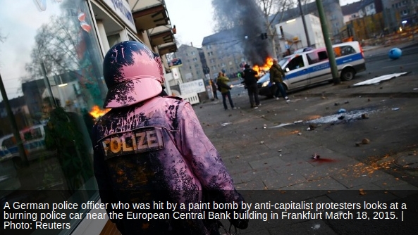 police_-_frankfurt_paint_bombed_cop.jpg 