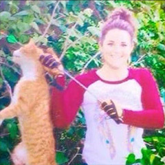 kristen_lindsey_texas_veterinarian_cat_killing_bow_and_arrow.jpg 