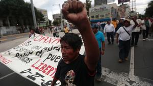mexico_teachers_march_with_fist.jpeg
