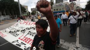 mexico_teachers_march_with_fist.jpeg 