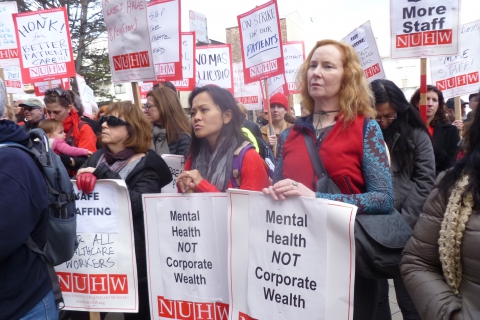 480_nuhw_members_with_picket_signs_1.jpg