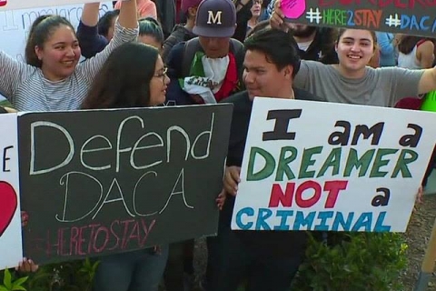 defend-daca-here-to-stay.jpg