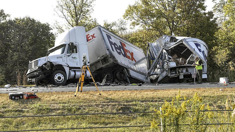 fedex_truck_wrecks_off_road_deaths.jpeg